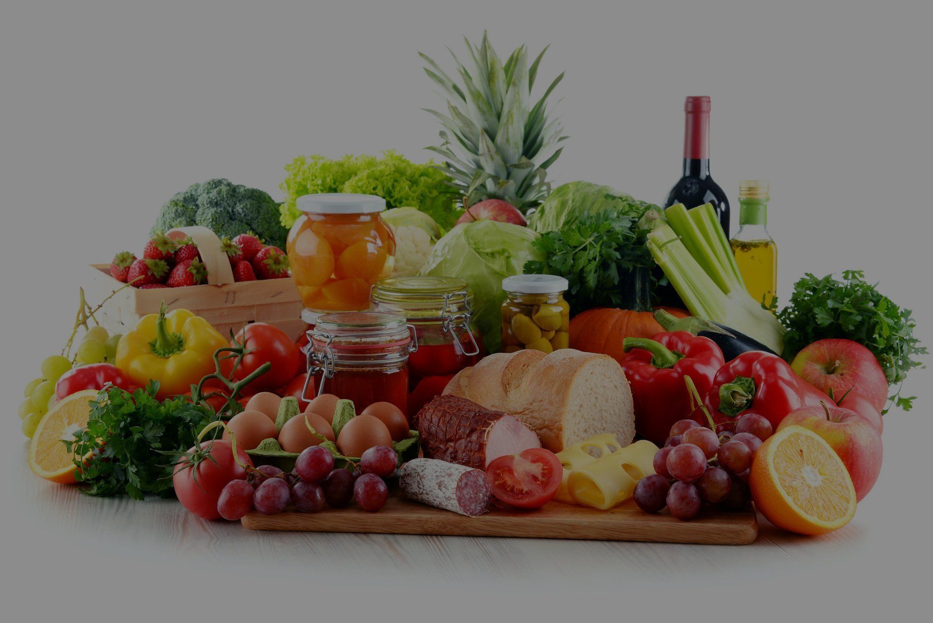 A variety of fruits and vegetables are on a table